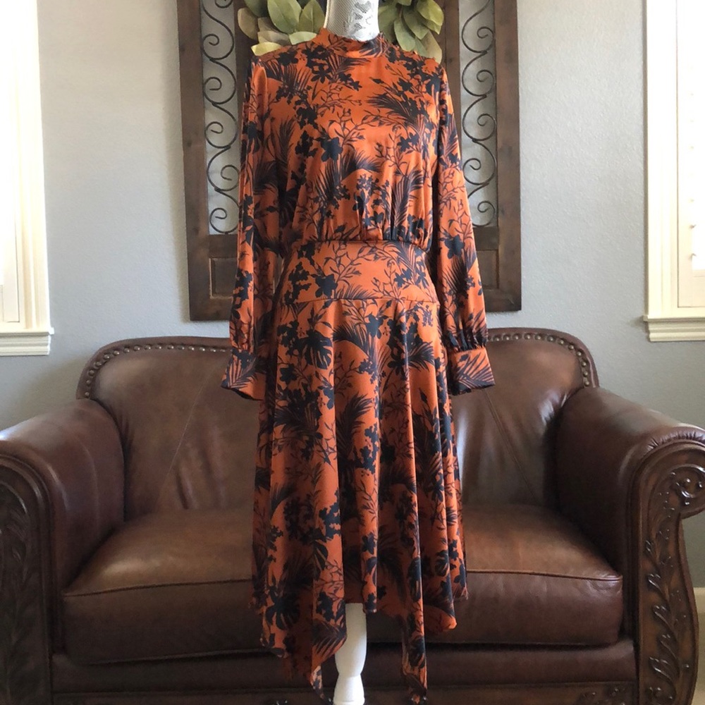 Kahlana Barfield Brown orange and black dress